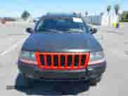 2002 Jeep Grand Cherokee Sport with VIN 1J4GW38S52C236109, listed as a IAAI auction lot 42317056 with 193,949 mi miles and . Bid and sale history available at DreamBid. Image 12.