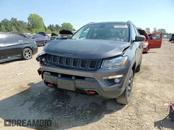 2020 Jeep Compass Trailhawk with VIN 3C4NJDDBXLT163395, listed as a Copart auction lot 81366435 with 56,199 mi miles and Salvage title. Bid and sale history available at DreamBid. Image 13.