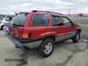 2002 Jeep Grand Cherokee с VIN 1J8GX38S92C176329, выставлен на аукционе Copart как лот 47885635 с пробегом 154 167 миль миль и Списание • Salvage title. История ставок и продаж доступна на DreamBid. Изображение 3.