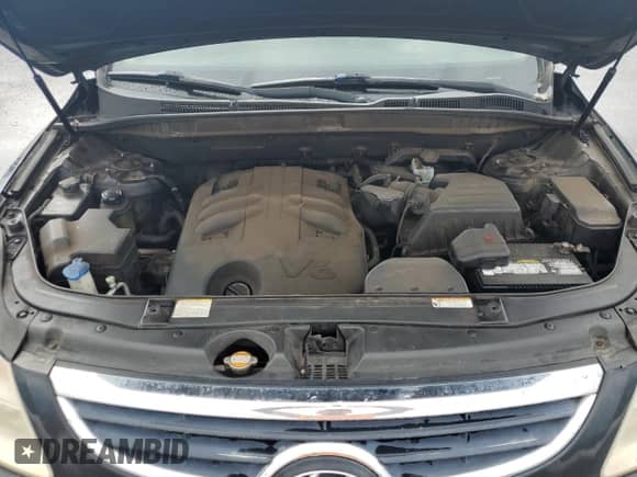 2012 Hyundai Veracruz Limited z VIN KM8NU4CC5CU188501, wystawiony jako Copart lot #76837674 z przebiegiem 217 809 mil mil oraz Szkoda całkowita • Salvage title. Historia ofert i sprzedaży dostępna na DreamBid. Obrazek 12.