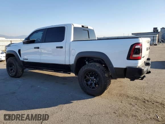 2023 Ram 1500 TRX z VIN 1C6SRFU96PN503305, wystawiony jako Copart lot #50205075 z przebiegiem 20 794 mil mil oraz Czysty tytuł • Clean title. Historia ofert i sprzedaży dostępna na DreamBid. Obrazek 2.