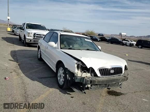 2004 Hyundai Sonata GLS z VIN KMHWF35H64A073703, wystawiony jako Copart lot #74333504 z przebiegiem 105 034 mil mil oraz Szkoda całkowita • Salvage title. Historia ofert i sprzedaży dostępna na DreamBid. Obrazek 10.