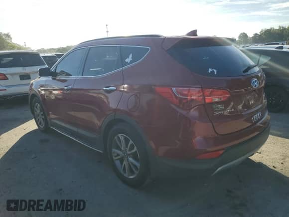 2014 Hyundai Santa Fe с VIN 5XYZU3LA3EG125576, выставлен на аукционе Copart как лот 70799815 с пробегом 134 088 миль миль и Списание • Salvage title. История ставок и продаж доступна на DreamBid. Изображение 2.