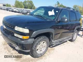 2002 Chevrolet Tahoe Z71 with VIN 1GNEK13ZX2R275185, listed as a IAAI auction lot 43412229 with 235,789 mi miles and . Bid and sale history available at DreamBid. Image 2.