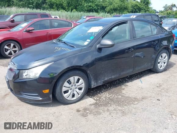 2014 Chevrolet Cruze LS with VIN 1G1PB5SH1E7130630, listed as a IAAI auction lot 42630728 with 142,717 mi miles and . Bid and sale history available at DreamBid. Image 2.