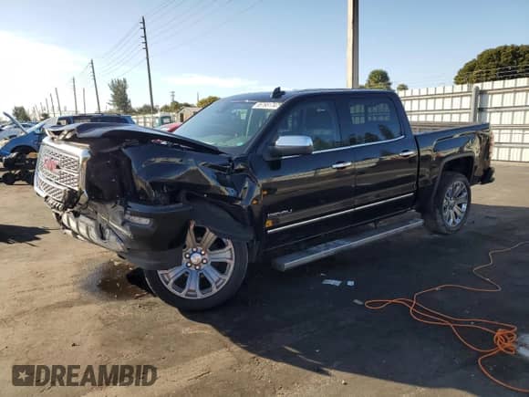 2017 GMC Sierra 1500 Denali with VIN 3GTP1PEC7HG375091, listed as a Copart auction lot 85765174 with 90,593 mi miles and Salvage title. Bid and sale history available at DreamBid. Image 1.