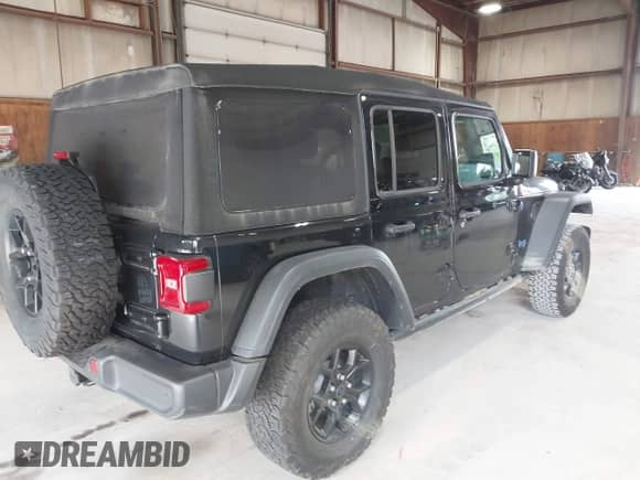 2024 Jeep Wrangler Sport S with VIN 1C4RJXN69RW162892, listed as a IAAI auction lot 42924257 with 15 mi miles and . Bid and sale history available at DreamBid. Image 4.