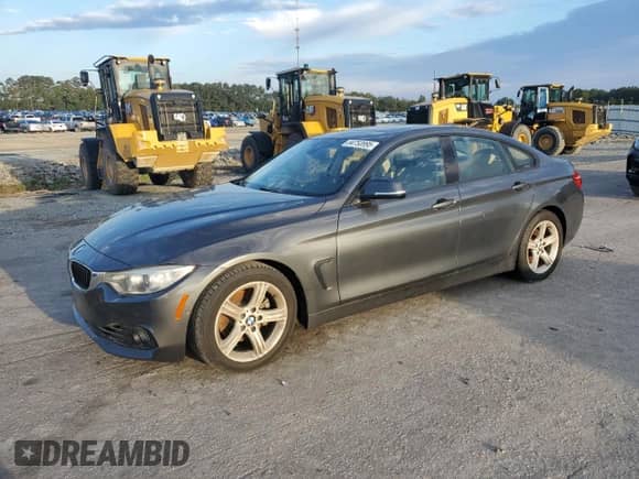 2015 BMW 4 Series 428i with VIN WBA4A5C57FD410456, listed as a Copart auction lot 84753995 with 165,977 mi miles and Clean title. Bid and sale history available at DreamBid. Image 1.