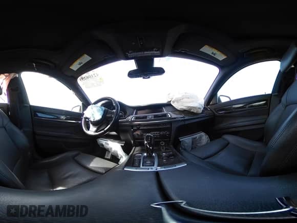 2015 BMW 7 Series with VIN WBAYG6C59FD383735, listed as a IAAI auction lot 42106255 with 107,936 mi miles and . Bid and sale history available at DreamBid. Image 18.