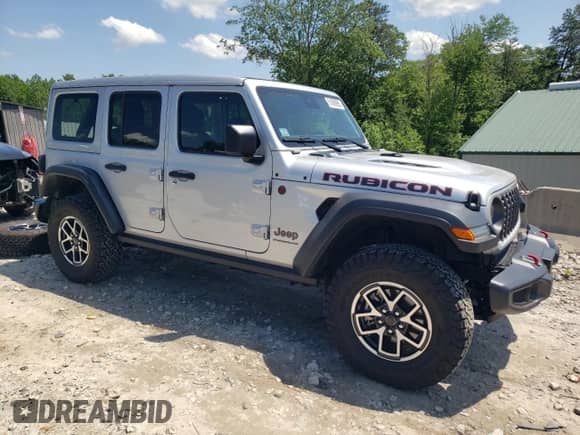 2024 Jeep Wrangler Rubicon with VIN 1C4PJXFG6RW334116, listed as a Copart auction lot 61608985 with 6,881 mi miles and Salvage title. Bid and sale history available at DreamBid. Image 4.