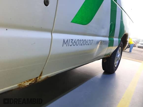 2011 Ford Econoline Cargo Commercial with VIN 1FTNE2EL2BDA70911, listed as a IAAI auction lot 43563678 with 148,036 mi miles and . Bid and sale history available at DreamBid. Image 32.