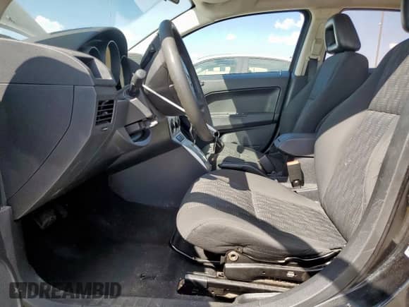 2008 Dodge Caliber SE z VIN 1B3HB28B88D701583, wystawiony jako Copart lot #62349225 z przebiegiem 173 377 mil mil oraz Szkoda całkowita • Salvage title. Historia ofert i sprzedaży dostępna na DreamBid. Obrazek 7.