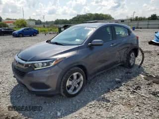 2020 Honda HR-V LX с VIN 3CZRU5H37LM714159, выставлен на аукционе Copart как лот 68921625 с пробегом 87 089 миль миль и Списание • Salvage title. История ставок и продаж доступна на DreamBid. Изображение 1.