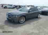 2013 Dodge Charger RT z VIN 2C3CDXCT5DH716883, wystawiony jako IAAI lot #41884762 z przebiegiem 240 867 mil mil oraz . Historia ofert i sprzedaży dostępna na DreamBid. Obrazek 14.