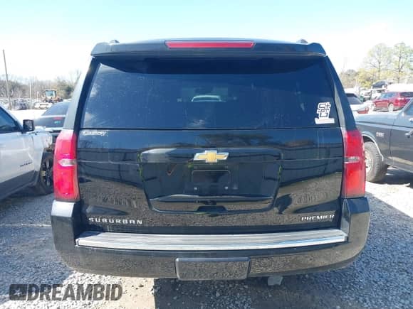 2019 Chevrolet Suburban Premier with VIN 1GNSCJKC5KR360318, listed as a IAAI auction lot 41504344 with 82,997 mi miles and . Bid and sale history available at DreamBid. Image 16.
