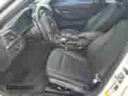 2014 BMW 3 Series 328i with VIN WBA3C1C55EK106910, listed as a Copart auction lot 65017595 with 124,408 mi miles and Salvage title. Bid and sale history available at DreamBid. Image 7.