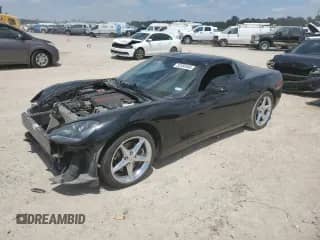 2013 Chevrolet Corvette 1LT with VIN 1G1YE2DW2D5106076, listed as a Copart auction lot 52350595 with 52,419 mi miles and Salvage title. Bid and sale history available at DreamBid. Image 1.