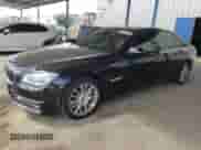2014 BMW 7 Series ALPINA B7 with VIN WBAYE8C5XED136160, listed as a Copart auction lot 80190935 with 122,086 mi miles and Salvage title. Bid and sale history available at DreamBid. Image 1.