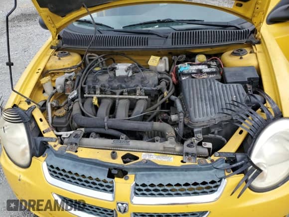 2004 Dodge Neon SXT with VIN 1B3ES56C84D538802, listed as a Copart auction lot 82187635 with 159,319 mi miles and Salvage title. Bid and sale history available at DreamBid. Image 11.