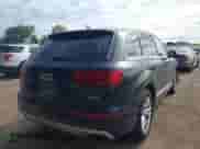 2017 Audi Q7 Premium Plus with VIN WA1LAAF72HD035643, listed as a IAAI auction lot 43012406 with 157,938 mi miles and . Bid and sale history available at DreamBid. Image 4.