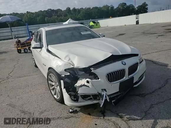 2014 BMW 5 Series 535i z VIN WBA5B1C58ED480122, wystawiony jako Copart lot #69944575 z przebiegiem 83 583 mil mil oraz Szkoda całkowita • Salvage title. Historia ofert i sprzedaży dostępna na DreamBid. Obrazek 13.