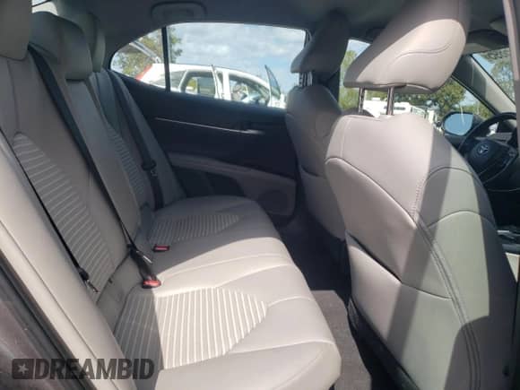 2019 Toyota Camry Hybrid SE с VIN 4T1B21HK2KU521372, выставлен на аукционе Copart как лот 85365895 с пробегом 79 115 миль миль и Списание • Salvage title. История ставок и продаж доступна на DreamBid. Изображение 10.