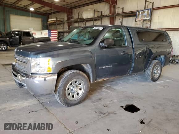 2012 Chevrolet Silverado 1500 Work Truck z VIN 1GCNKPEX6CZ336203, wystawiony jako Copart lot #85278025 z przebiegiem 117 157 mil mil oraz Szkoda całkowita • Salvage title. Historia ofert i sprzedaży dostępna na DreamBid. Obrazek 1.