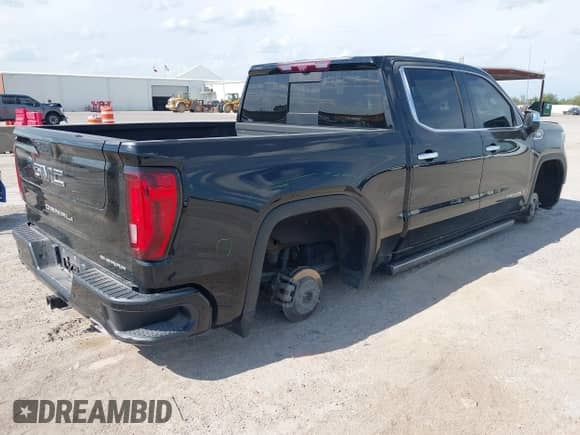 2021 GMC Sierra 1500 Denali with VIN 3GTU9FET5MG303337, listed as a IAAI auction lot 43105491 with 76,727 mi miles and . Bid and sale history available at DreamBid. Image 4.