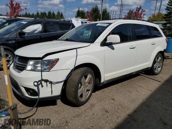 2012 Dodge Journey SXT z VIN 3C4PDDBG6CT181634, wystawiony jako Copart lot #72054905 z przebiegiem 198 496 mil mil oraz Czysty tytuł • Clean title. Historia ofert i sprzedaży dostępna na DreamBid. Obrazek 1.