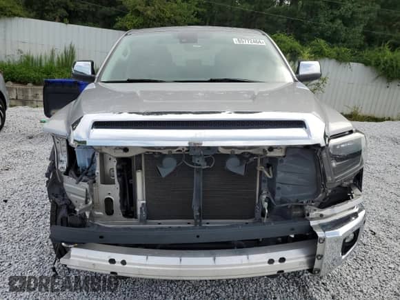 2020 Toyota Tundra Platinum с VIN 5TFGY5F17LX263151, выставлен на аукционе Copart как лот 65772464 с пробегом 104 218 миль миль и Списание • Salvage title. История ставок и продаж доступна на DreamBid. Изображение 5.