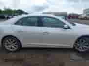 2015 Chevrolet Malibu LTZ with VIN 1G11F5SL0FF220857, listed as a IAAI auction lot 42107647 with 143,330 mi miles and . Bid and sale history available at DreamBid. Image 13.