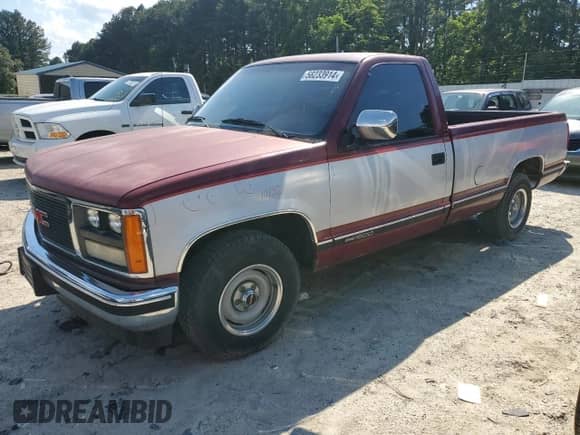 1989 GMC Sierra 1500 with VIN 1GTDC14H6KE537928, listed as a Copart auction lot 58233914 with 90,754 mi miles and Salvage title. Bid and sale history available at DreamBid. Image 1.