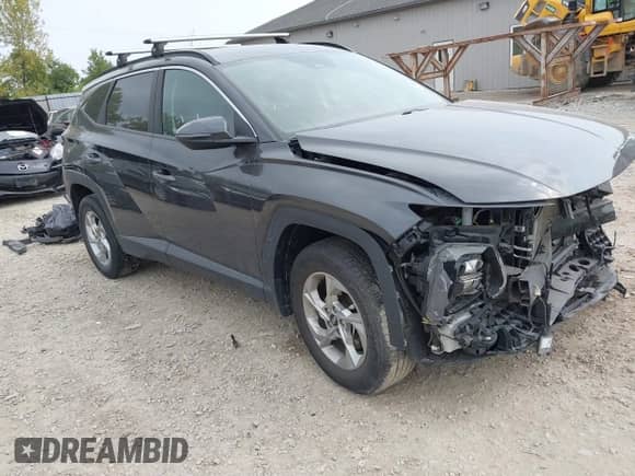 2022 Hyundai Tucson SEL z VIN 5NMJBCAEXNH088945, wystawiony jako IAAI lot #43153690 z przebiegiem 59 495 mil mil oraz . Historia ofert i sprzedaży dostępna na DreamBid. Obrazek 1.