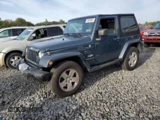 2008 Jeep Wrangler Sahara с VIN 1J8FA541X8L519597, выставлен на аукционе Copart как лот 83830965 с пробегом 141 463 миль миль и Списание • Salvage title. История ставок и продаж доступна на DreamBid. Изображение 1.