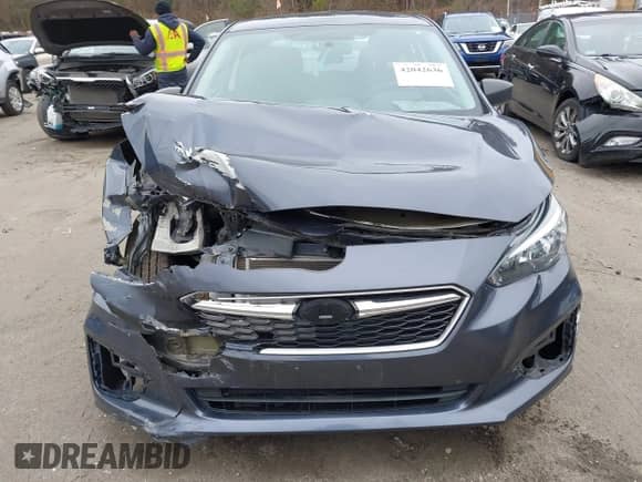 2017 Subaru Impreza with VIN 4S3GKAA63H3603908, listed as a IAAI auction lot 42042636 with 62,697 mi miles and . Bid and sale history available at DreamBid. Image 13.