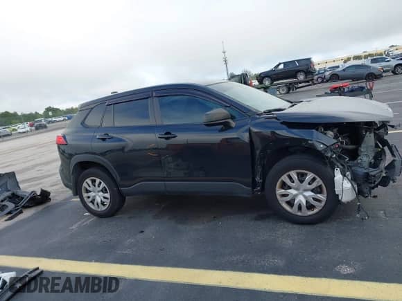 2022 Toyota Corolla Cross L with VIN 7MUAAAAG7NV001692, listed as a IAAI auction lot 43191085 with 117,121 mi miles and . Bid and sale history available at DreamBid. Image 14.