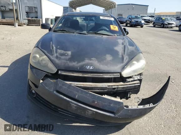 2008 Hyundai Tiburon GS с VIN KMHHM66D08U266221, выставлен на аукционе Copart как лот 58016965 с пробегом 134 420 миль миль и Списание • Salvage title. История ставок и продаж доступна на DreamBid. Изображение 5.
