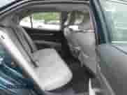 2021 Toyota Camry Hybrid XLE with VIN 4T1F31AK8MU563752, listed as a IAAI auction lot 42134620 with 19,484 mi miles and . Bid and sale history available at DreamBid. Image 8.