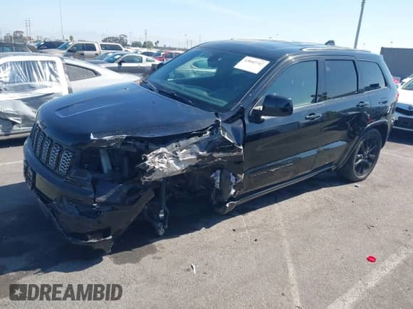 2020 Jeep Grand Cherokee Altitude z VIN 1C4RJEAG9LC279125, wystawiony jako IAAI lot #43042747 z przebiegiem 99 538 mil mil oraz . Historia ofert i sprzedaży dostępna na DreamBid. Obrazek 2.
