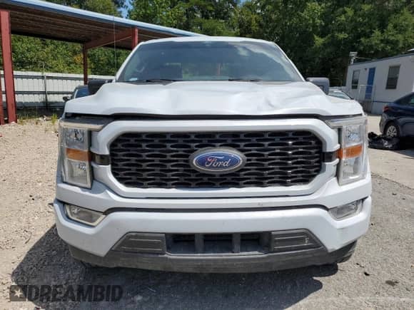 2021 Ford F-150 XL с VIN 1FTEW1CP3MKD30888, выставлен на аукционе Copart как лот 70834225 с пробегом 125 042 миль миль и Списание • Salvage title. История ставок и продаж доступна на DreamBid. Изображение 5.