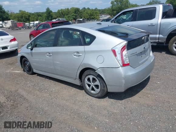 2013 Toyota Prius One with VIN JTDKN3DUXD5619786, listed as a IAAI auction lot 42947005 with 121,396 mi miles and . Bid and sale history available at DreamBid. Image 3.