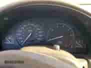1999 Saturn SC with VIN 1G8ZR1274XZ262181, listed as a Copart auction lot 75931774 with Not provided miles and Salvage title. Bid and sale history available at DreamBid. Image 9.