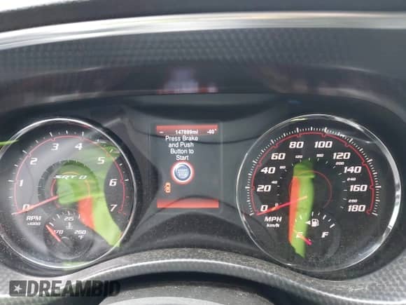 2013 Dodge Charger SRT-8 z VIN 2C3CDXEJ1DH529586, wystawiony jako IAAI lot #41636903 z przebiegiem 147 899 mil mil oraz . Historia ofert i sprzedaży dostępna na DreamBid. Obrazek 7.