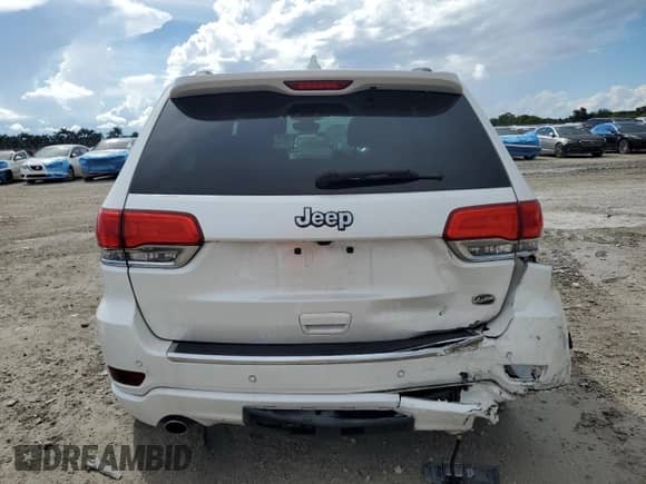 2017 Jeep Grand Cherokee Overland with VIN 1C4RJECG4HC740042, listed as a Copart auction lot 83797275 with 67,534 mi miles and Salvage title. Bid and sale history available at DreamBid. Image 6.