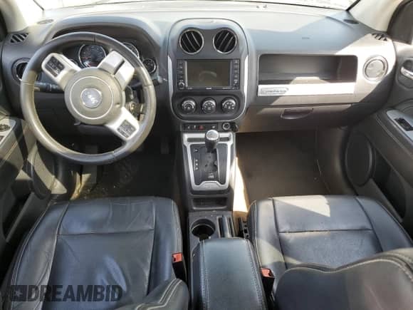 2017 Jeep Compass Latitude with VIN 1C4NJCEA3HD117971, listed as a Copart auction lot 60521815 with 73,376 mi miles and Salvage title. Bid and sale history available at DreamBid. Image 8.
