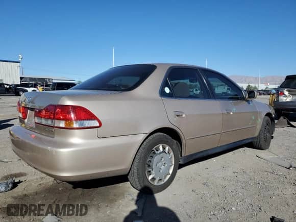 2002 Honda Accord LX with VIN 3HGCG56482G706827, listed as a Copart auction lot 86818665 with 144,059 mi miles and Salvage title. Bid and sale history available at DreamBid. Image 3.