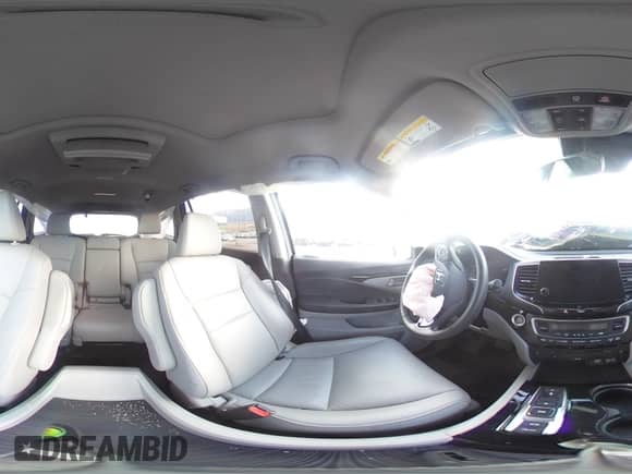 2020 Honda Pilot Touring 8-Passenger z VIN 5FNYF6H97LB001613, wystawiony jako Copart lot #72004285 z przebiegiem Nie podano mil oraz Szkoda całkowita • Salvage title. Historia ofert i sprzedaży dostępna na DreamBid. Obrazek 16.