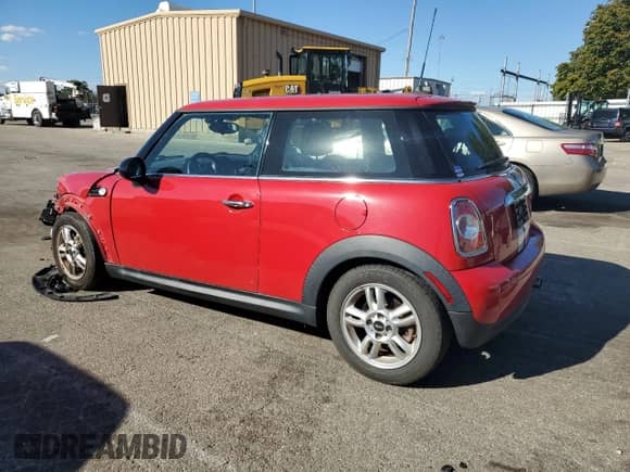 2013 MINI Hardtop with VIN WMWSU3C52DT370051, listed as a Copart auction lot 82431165 with 68,570 mi miles and Salvage title. Bid and sale history available at DreamBid. Image 2.