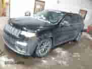 2017 Jeep Grand Cherokee Summit with VIN 1C4RJFJTXHC672075, listed as a IAAI auction lot 41597370 with 136,659 mi miles and . Bid and sale history available at DreamBid. Image 2.