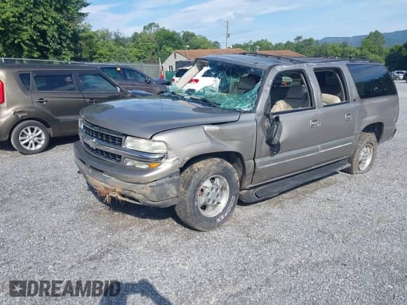 2002 Chevrolet Suburban LT with VIN 1GNFK16Z02J176373, listed as a IAAI auction lot 42769038 with 195,274 mi miles and . Bid and sale history available at DreamBid. Image 2.